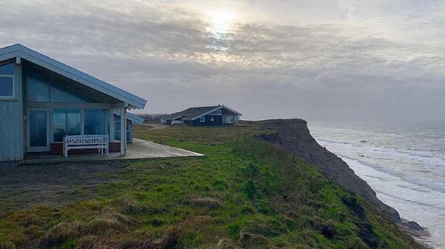 Steilküstenabbruch Ferienhaus nähert sich dem Hang SH